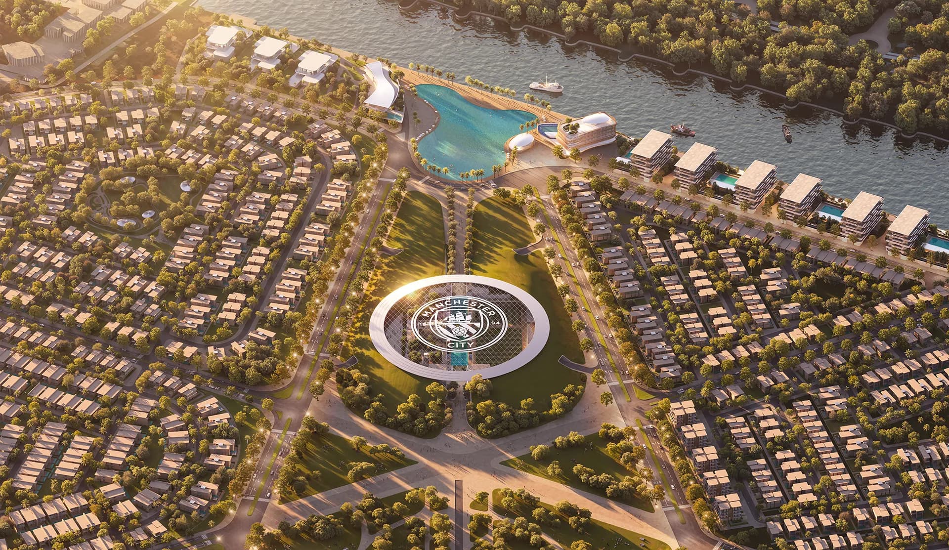 Manchester City Yas Residences by Ohana — aerial of the Yas Canal masterplan with the training academy at its centre